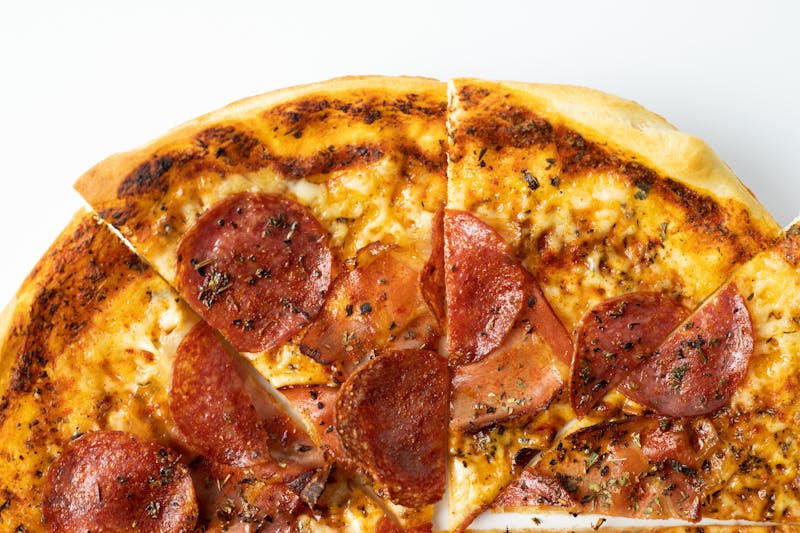 Tristan signature pizza with mushrooms and truffle oil
